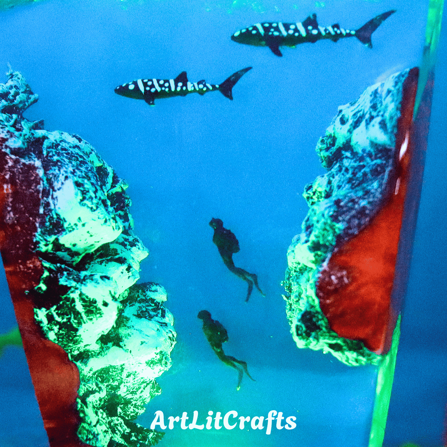 Close-up of whale shark and diver details inside handmade resin lamp