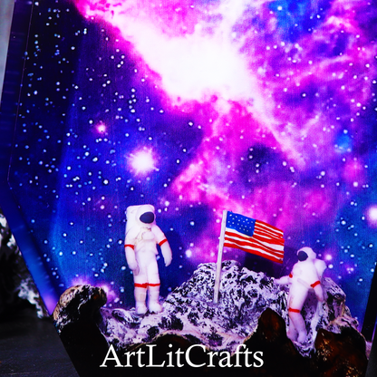 Illustration of astronauts on the moon with a U.S.