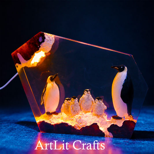 handmade penguin family resin lamp with glowing Arctic scene and 'ArtLit Crafts' branding