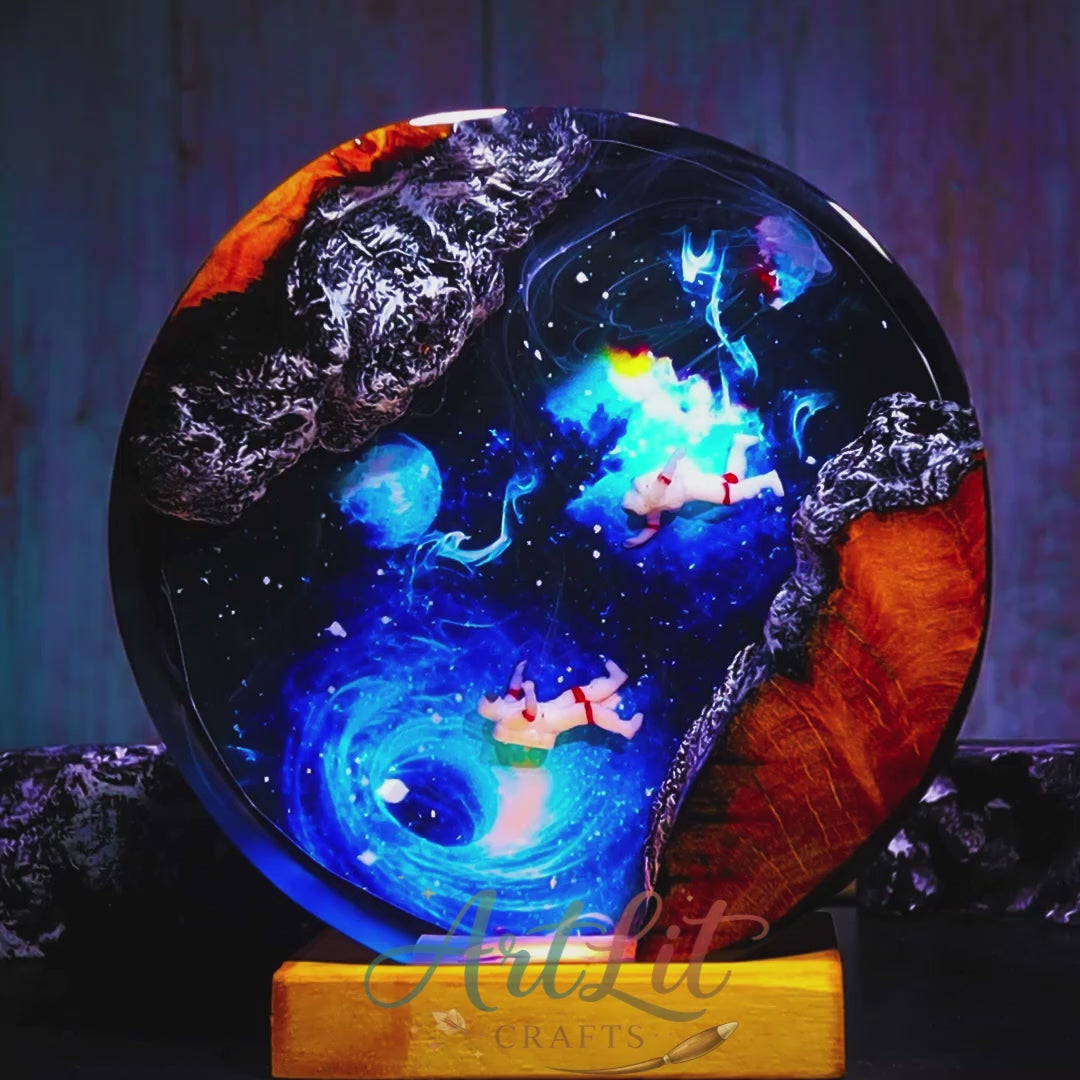 Astronaut resin lamp with galactic vortex scene video