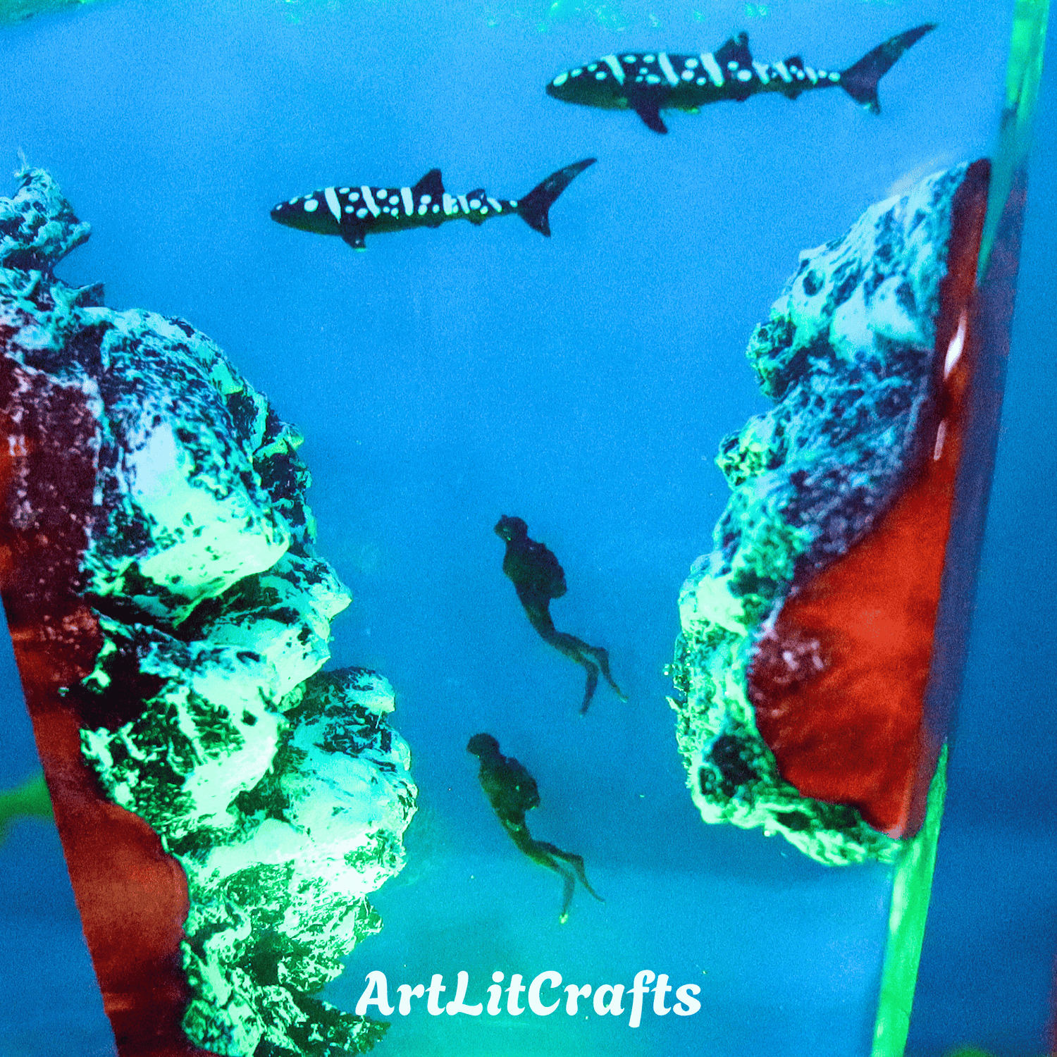 Close-up of whale shark and diver details inside handmade resin lamp