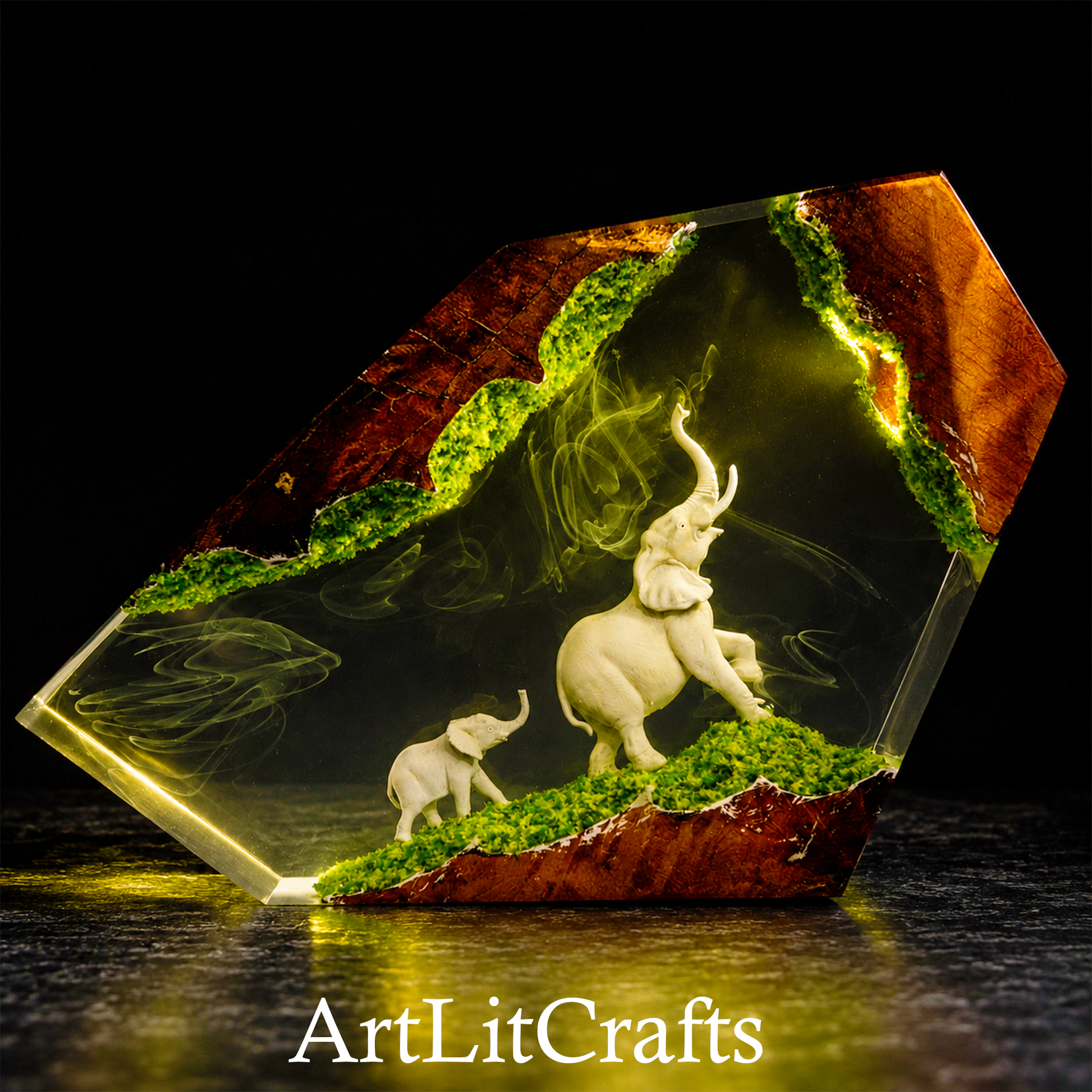 Epoxy resin lamp feature elephants and greenery, featuring the brand 'ArtLitCrafts'.